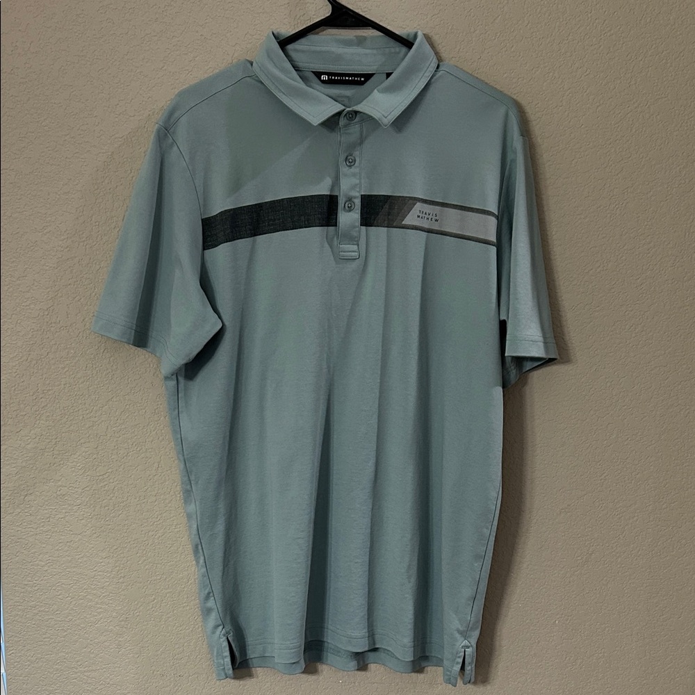 Travis Mathew Men's Blue Polo Shirt with Black Stripe size Large VGUC‎